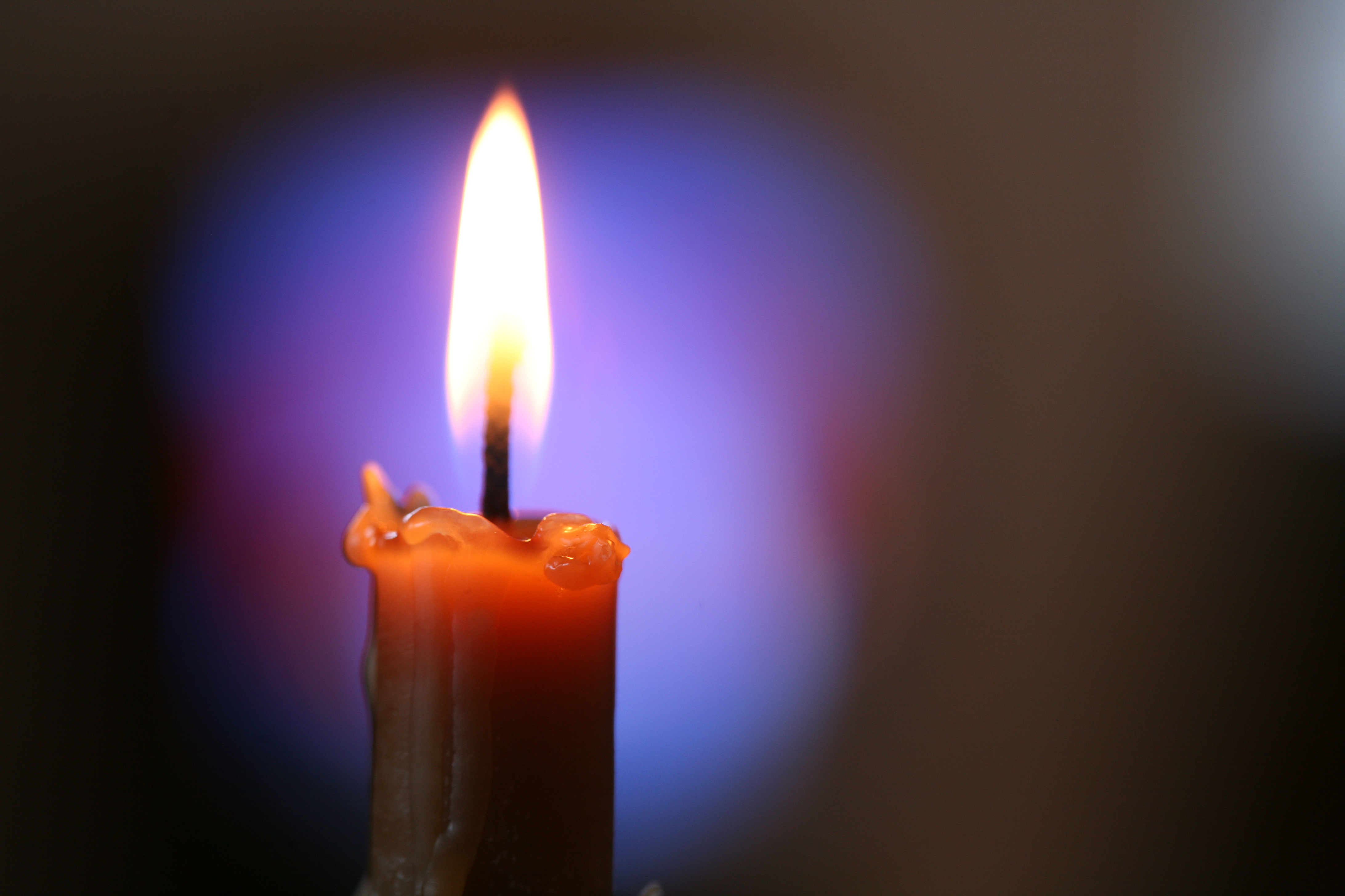 candle in a dark colored background
